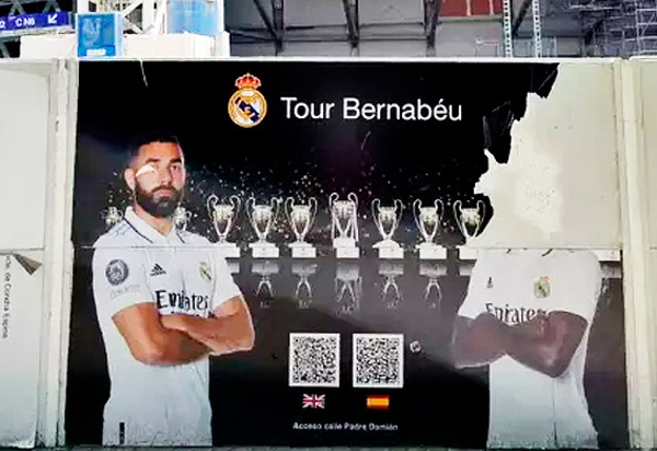 Foto de Vini Jr é rasgada em pôster no Santiago Bernabéu antes de jogo desta quarta